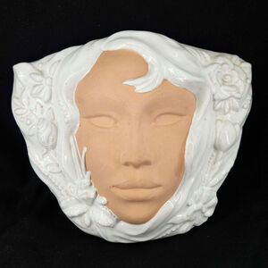 Vintage art nouveau style glazed Pottery woman's face wall pocket